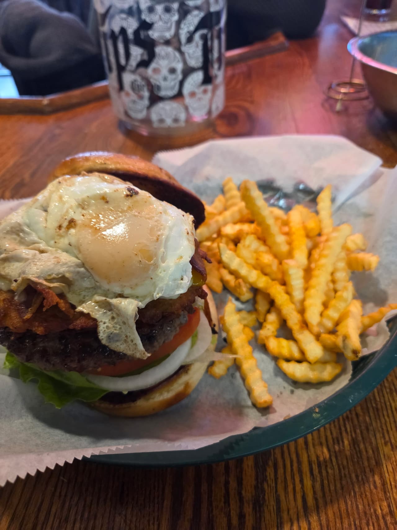 The Farm House burger with an egg and crinkle fries